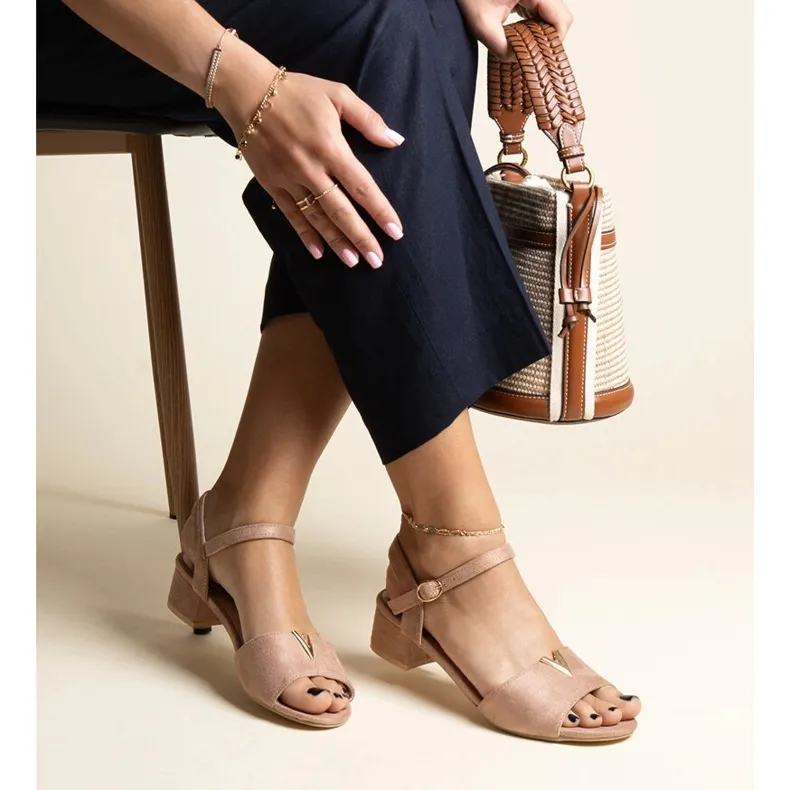 Dark beige low-heeled sandals with a Horner buckle