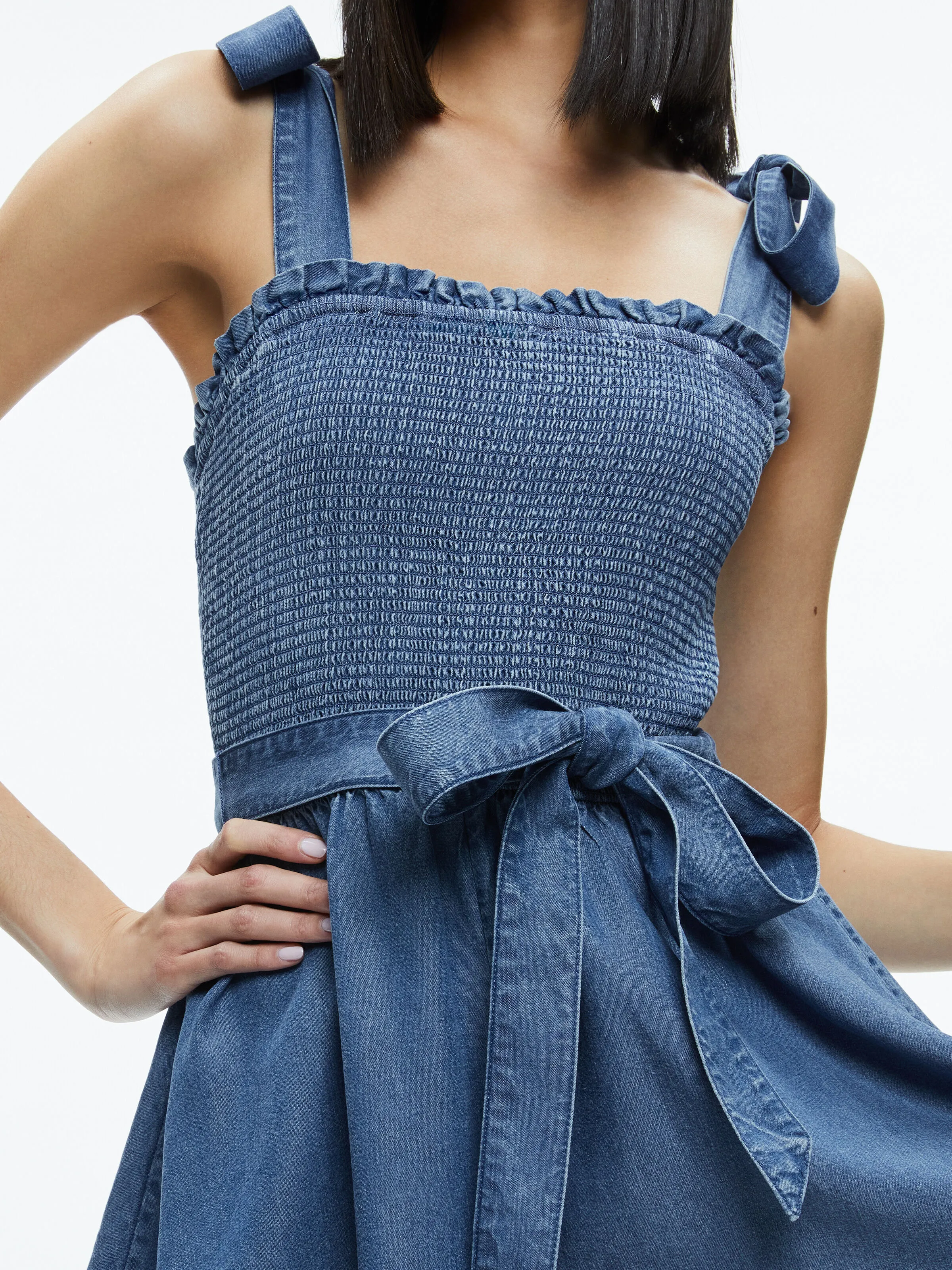 ROZ SMOCKED CHAMBRAY ROMPER