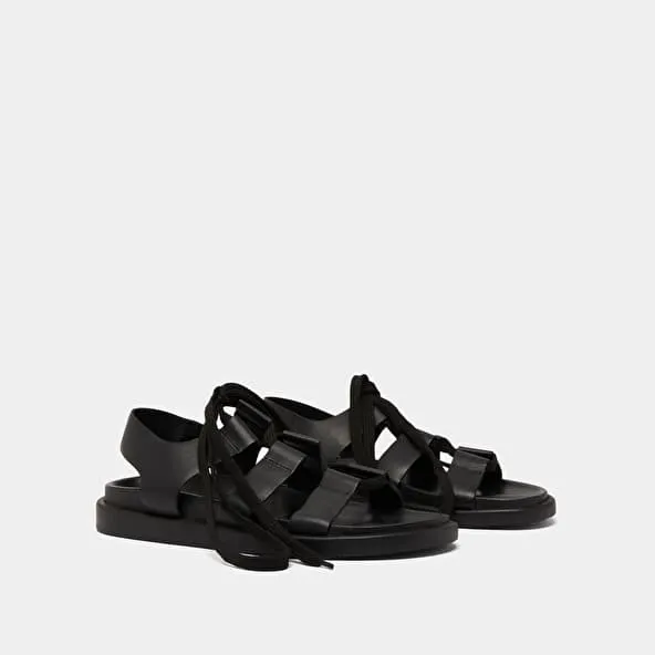 Sandals with multiple straps and laces in black leather