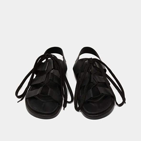 Sandals with multiple straps and laces in black leather